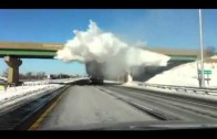 Snow Explodes As Truck Passes Under Bridge (Amazing Footage)