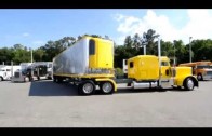 Big trucks hauling oversized load