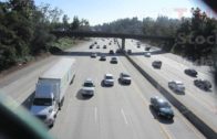 Cars & Trucks Driving on Interstate Highway Fwy Underneath Freeway Overpass | HD Stock Video Footage