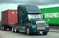 Big trucks hauling oversized load